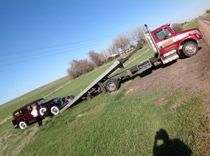 Loading on to the AAA truck to pull it the rest of the way to Rapid City.